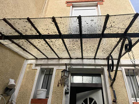 Marquise en fer forgé à rénover