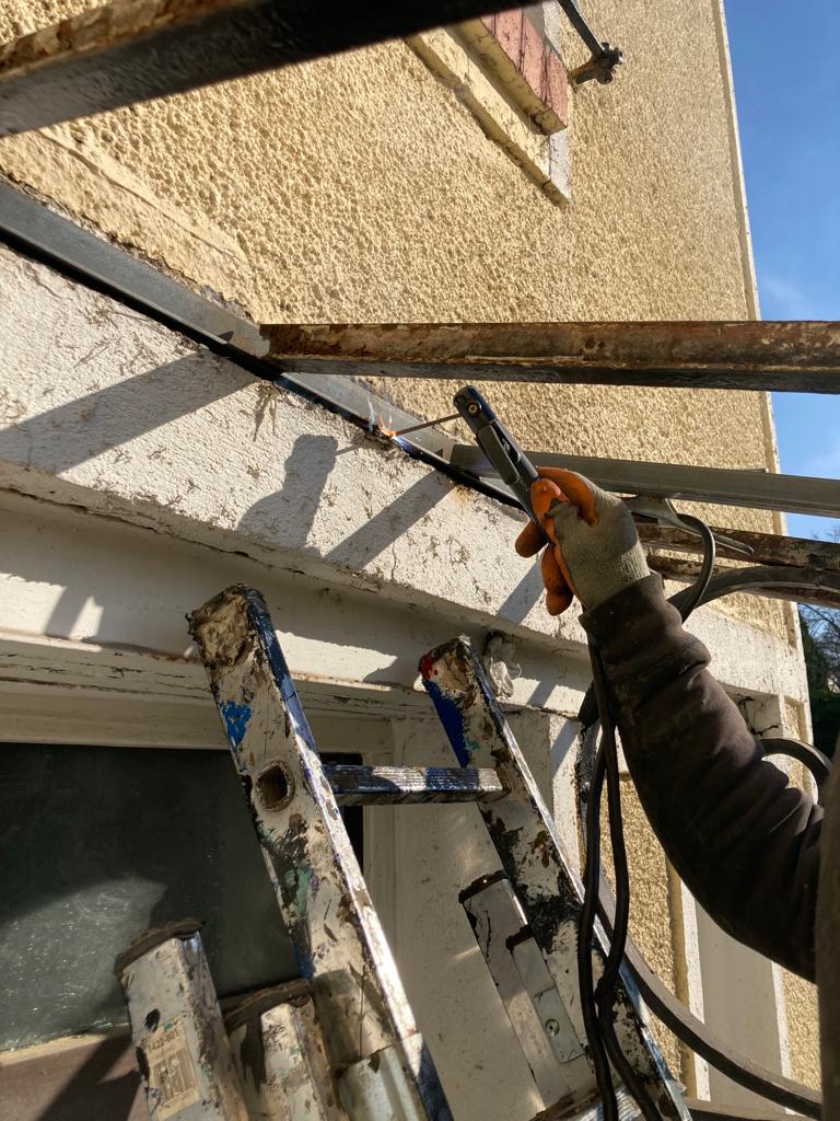 Changement de structure métallique sur une marquise